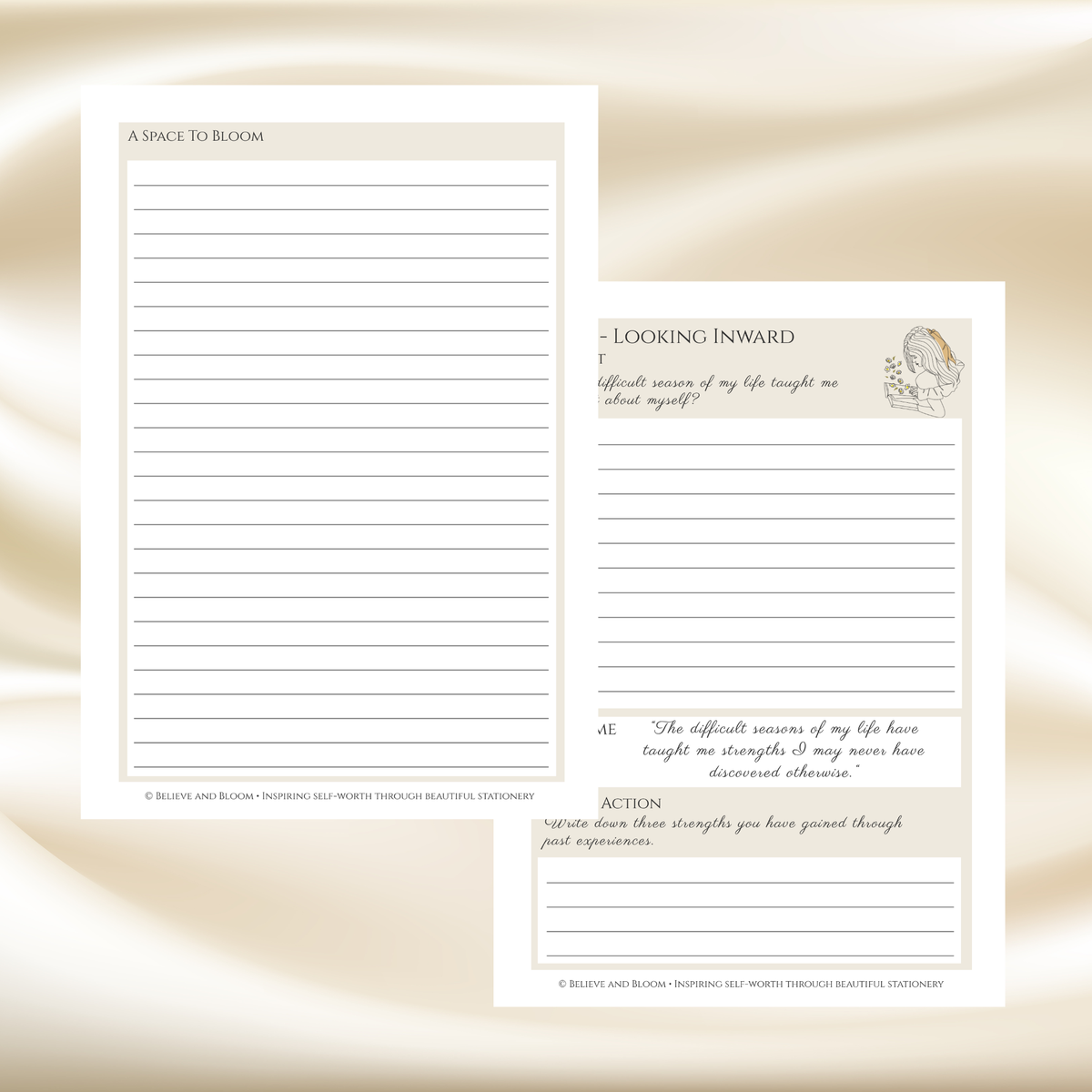 Two cream-colored lined journaling pages with beige headers and text prompts, displayed on a soft beige satin background. One page reads 'A SPACE TO BLOOM' and the other reads 'LOOKING INWARD' with a quote and illustration.